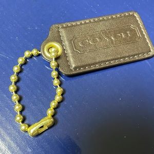 Authentic COACH brown hang tag